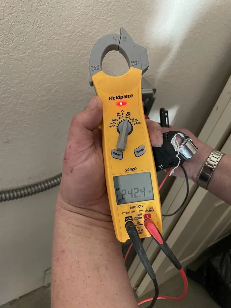 Voltage testing with clamp meter during Ceiling Fan Installation in Hidden Valley Lake